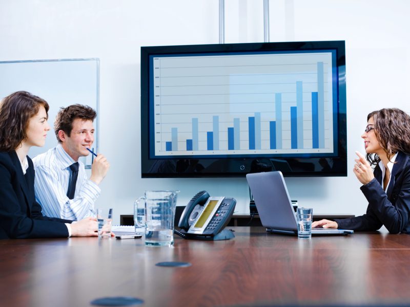 Businesspeople discussing in meeting room. Click here for other business images: